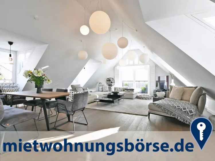 AIGNER – Lichtdurchflutetes Penthouse mit Dachterasse in bester Lage von Neuhausen