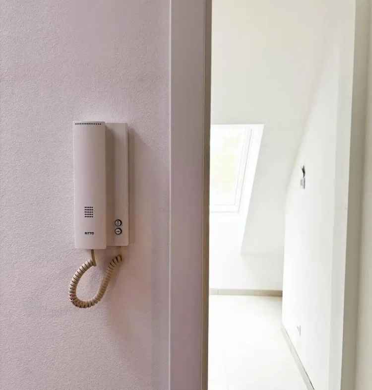 Erstbezug im charmanten Dachgeschoss – stilvolle 2-Zimmer-Wohnung mit hochwertiger Einbauküche