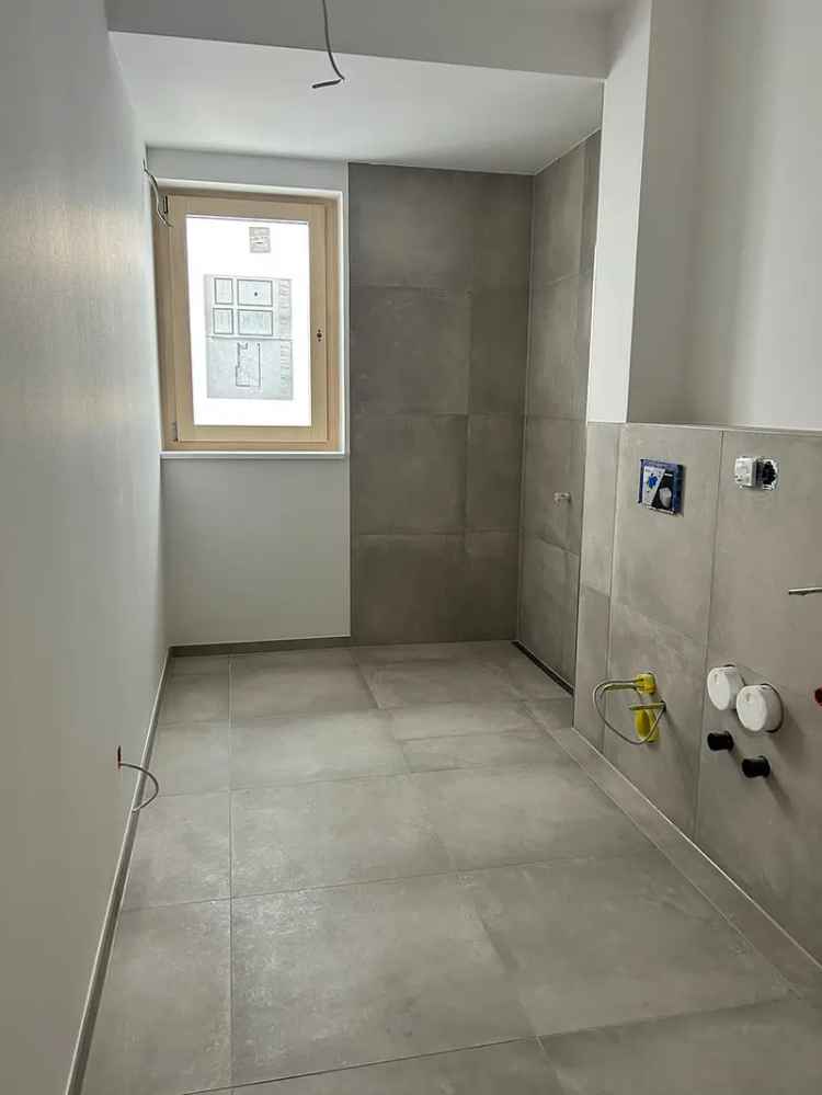 Erstbezug: 4-Zimmer Erdgeschosswohnung in zentraler Lage