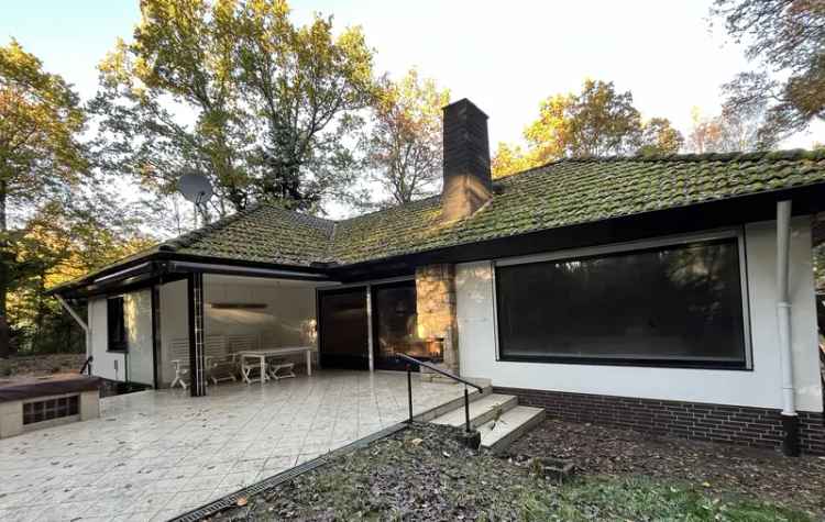 Wohnen in Celle-Osterloh. Bungalow auf einem parkähnlichen Grundstück