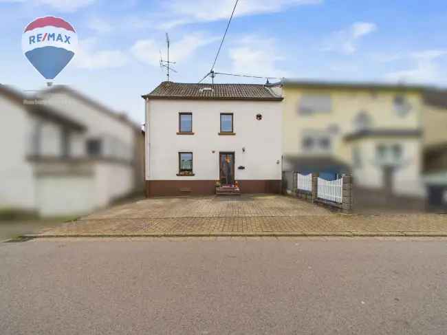Charmantes Reihenhaus in zentrumsnaher Lage von Losheim am See