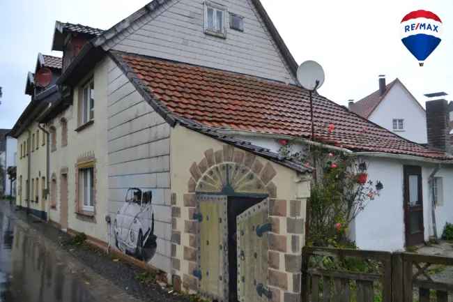 Renovierungsbedürftiges Reihenhaus in Brakel-City mit eigenem Garten: Gestalten Sie Ihr Traumhaus!