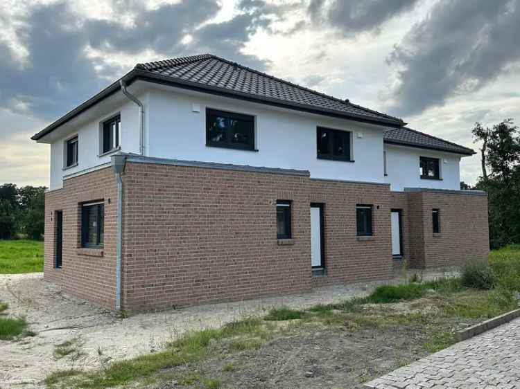 Kaufen Doppelhaushälfte Neubau in Düdenbüttel mit moderner Ausstattung