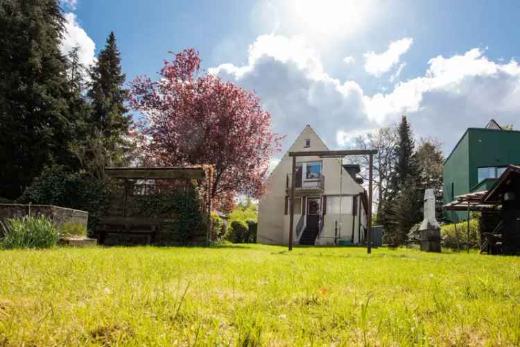 Charmantes Siedlungshaus mit großem Grundstück und zweitem Bauplatz