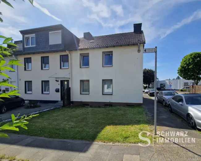 Sanierungsbedürftiges Reihenendhaus mit Garage in Viersen-Dülken