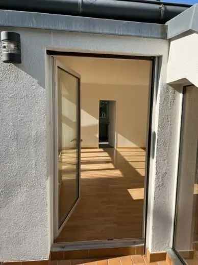 Ulmann Immobilien – traumhaftes Dachgeschoss mit Blick in den Sonnenuntergang