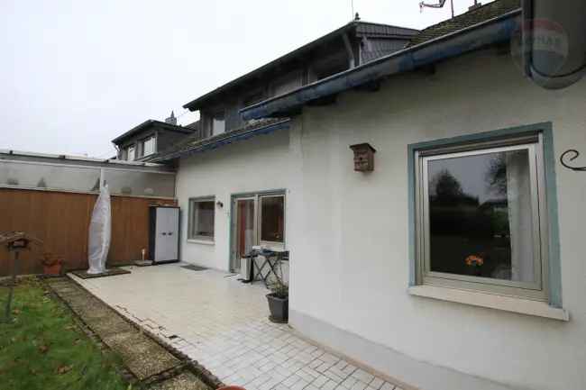 2 Familienhaus mit Garten in Bous