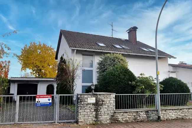 Familienhaus mit 3 Schlafräumen, großem Garten + Büro UG in Top Lage