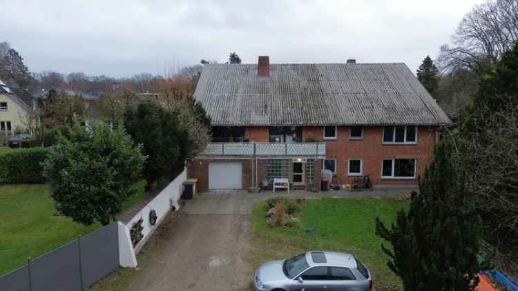 Kaufen Mehrfamilienhaus in Hamburg-Alt-Boberg mit großzügigem Grundstück