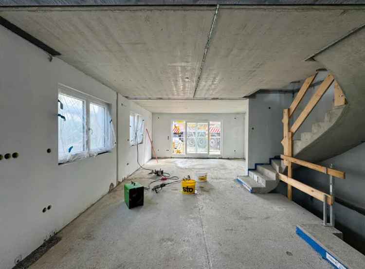 Grundstück mit Doppelhaushälfte im bereits erstellten Rohbau mit schönem Südgarten